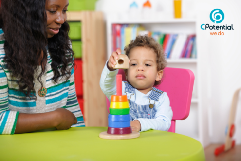 Child with global developmental delay playing